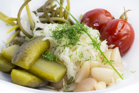 pickled vegetables, cucumber tomatoes asparagus and garlic cabbageの写真素材