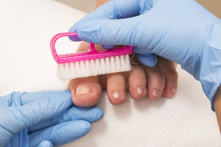 process of pedicure at beauty salon
