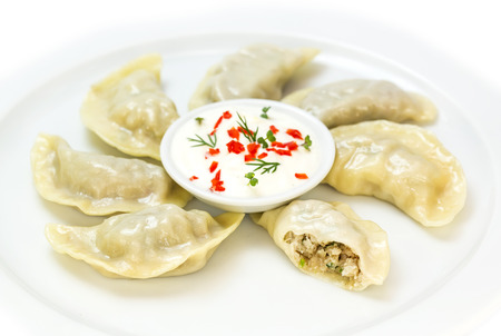 Nepalese food momo on a white background in the restaurantの写真素材