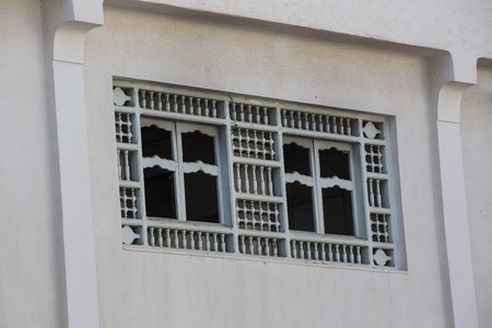 window opening in an old brick wallの写真素材