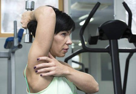 adult female bodybuilding competitions in the gymの写真素材