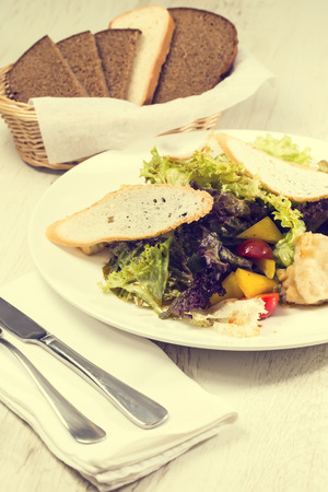 Caesar salad on the table in a restaurantの写真素材