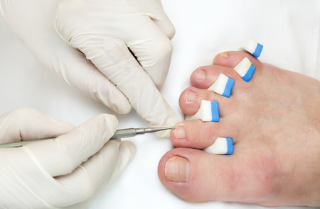 process of pedicure at beauty salonの写真素材