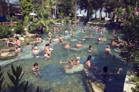 DENIZLI, TURKEY - JULY 16: People having bath in Cleopatra's thermal pool of Hierapolis on July 16, 2015.Denizli. Turkeyのeditorial素材