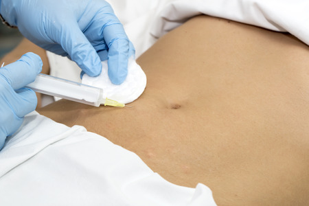 woman is in the process cellulite mesotherapy clinic