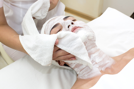 woman passes treatment mask facial at the beauty salonの写真素材