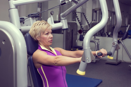 adult female bodybuilding competitions in the gymの写真素材
