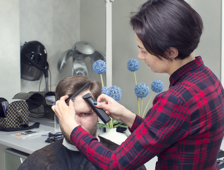 men's haircut in the salon barbershop beard closeupの写真素材