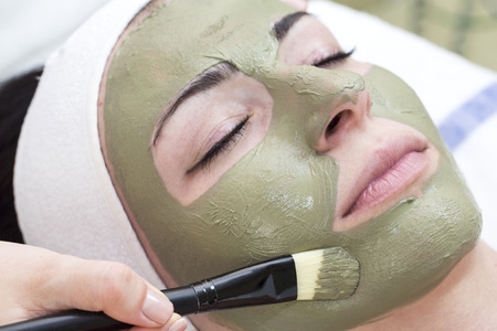 process of massage and facials in beauty salonの写真素材