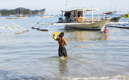 El NIDO, PHILIPPINES - FEB. 16: Morning in the harbor fishing village of El Nido FEB. 16, 2016 in El Nido Philippines.のeditorial素材