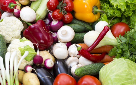 Background of fresh vegetables and greens closeupの写真素材