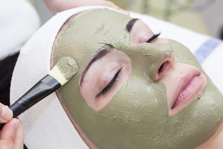 process of massage and facials in beauty salonの写真素材