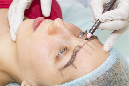 Mikrobleyding eyebrows workflow in a beauty salonの写真素材