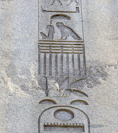 Egyptian hieroglyphics on the ancient granite slabsの写真素材
