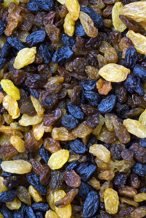 background dried raisin grapes closeup shotの写真素材
