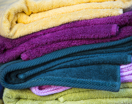 Background of the scrolls rolls colored colorful fabricの写真素材