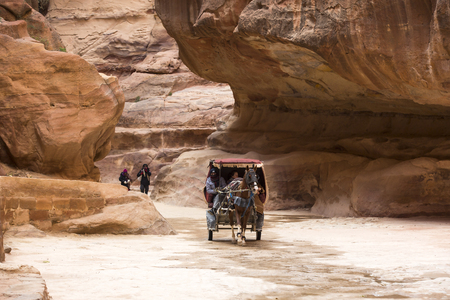 JORDAN, Ancient Petra - 10 JANUARY 2017: Tourist complex of the ancient city of Petra with tourists and locals: JANUARY 10, 2017 in Jordan. Ancient Petraのeditorial素材