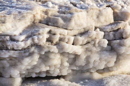 Dead Sea salt deposits stones white crystalsの写真素材