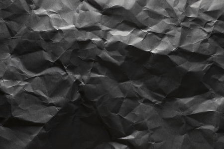 Background of colored crumpled paper shot close-upの写真素材