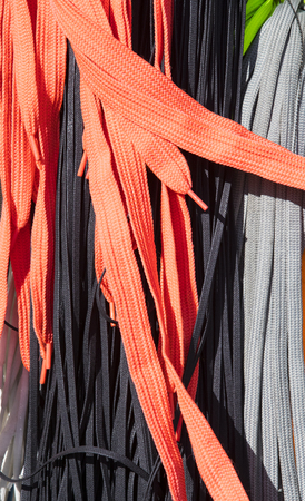 Background of colored shoe laces photo close-upの写真素材