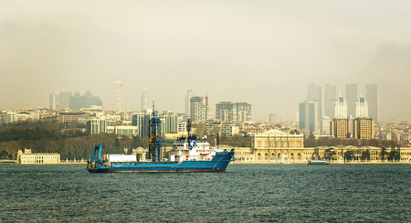 ISTANBUL, TURKEY - 5 APRIL, 2017: Panorama of Istanbul in the area of ââGolden Horn Bay on a cloudy foggy dayのeditorial素材