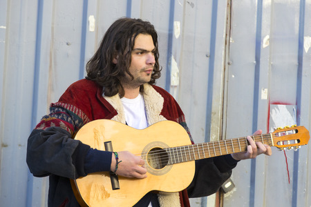 ISTANBUL, TURKEY - APRIL 1, 2017: Istiklal Street pedestrian street of the city with an old tram and street musicians shops and restaurants.のeditorial素材