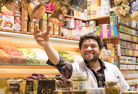 ISTANBUL, TURKEY - 7 APRIL, 2017: Sellers of spices and sweets in the Egyptian market in Istanbulのeditorial素材