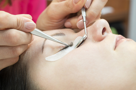 The process of eyelash extensions in the beauty salon