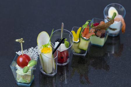 Molecular cuisine dishes in plastic buffetの写真素材