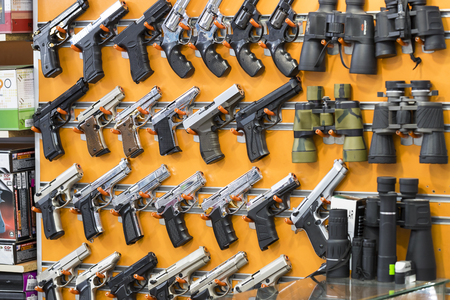 ISTANBUL, TURKEY - 4 APRIL 2017: Showcase of a gun shop in Istanbul at a weapons store on the Galata Bridge.のeditorial素材