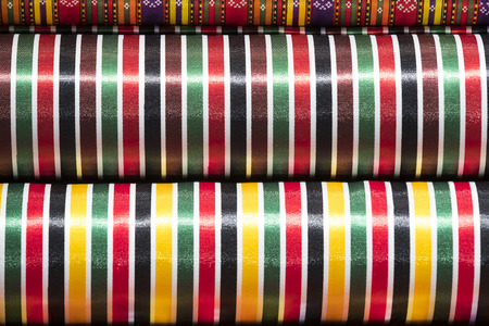 Colorful fabric scarves in stack as backgroundの写真素材