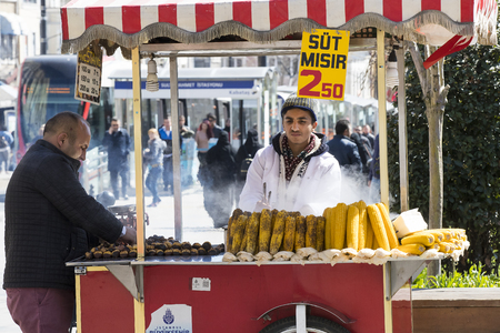 ISTANBUL, TURKEY - 1 APRIL, 2017: Sellers of fried corn chestnuts in the streets of Istanbul in Turkeyのeditorial素材