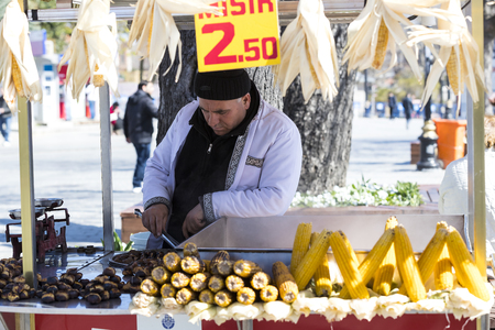 ISTANBUL, TURKEY - 1 APRIL, 2017: Sellers of fried corn chestnuts in the streets of Istanbul in Turkeyのeditorial素材