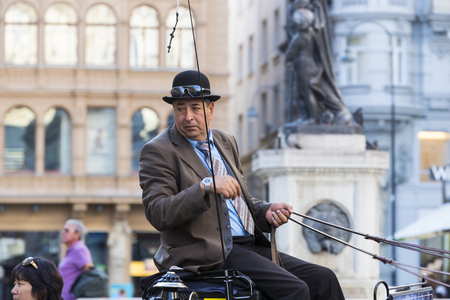 VIENNA, AUSTRIA - 23 AUGUST 2017: Traditional horse-drawn carriages with cabs for tourists to walk along the ancient streets of Vienna.のeditorial素材