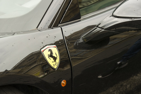 BUDAPEST, HUNGARY - 20 AUGUST 2017: Emblem of a Ferrari car shot closeup on the streets of the city