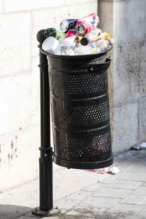 BUDAPEST, HUNGARY - 19 AUGUST 2017: Street trash cans are filled with garbage cans with plastic bottles of scans up to the top.のeditorial素材