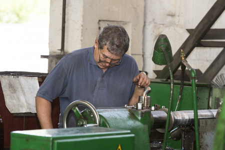 KHARKOV, UKRAINE - 8 JUNE 2017: Metalworking shop workers work machines and apparatuses to create steel structures.Kharkov. Ukraine-2017のeditorial素材
