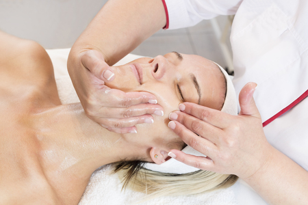 Process cosmetic mask of massage and facials in beauty salonの写真素材