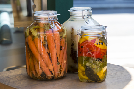 Glass jars with pickled vegetablesの写真素材