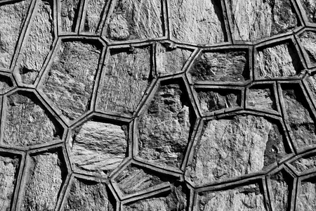 Black White stone wall background closeupの写真素材