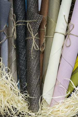 Rolls of wrapping paper binding with ropeの写真素材