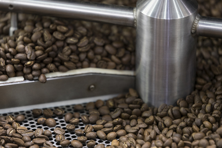 Industrial machine for roasting coffee beans close-up