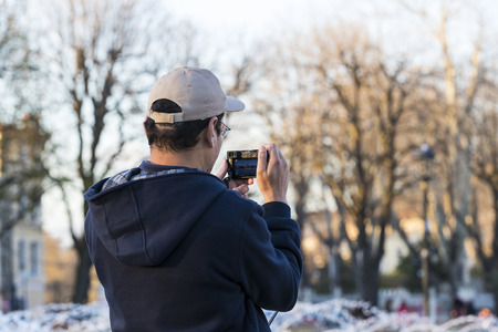 ISTANBUL, TURKEY - 2 APRIL, 2017: Tourists are photographed and make in the city of Istanbulのeditorial素材