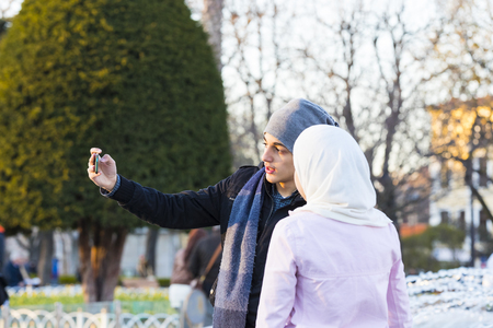 ISTANBUL, TURKEY - 2 APRIL, 2017: Tourists are photographed and make in the city of Istanbulのeditorial素材
