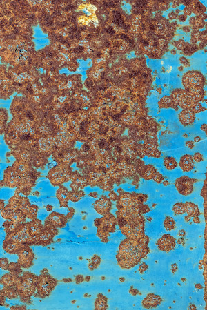 Background of rusty metal with irradiated paintの写真素材