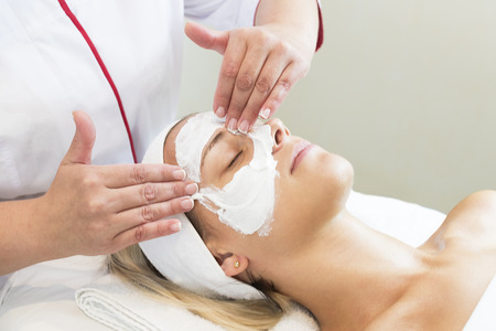 Process cosmetic mask of massage and facials in beauty salonの写真素材