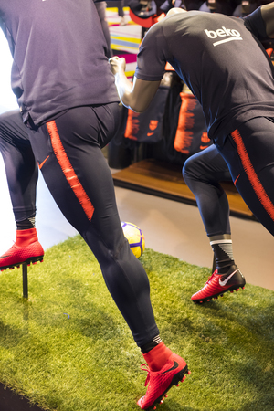BARCELONA, SPAIN - 12 JANUARY 2018: Official Store FC Barcelona, ??clothing and footwear team of souvenirs and paraphernalia for fans of the team and visitors of the stadium.のeditorial素材