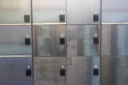 Background from the storage rooms with combination locks and numbersの写真素材