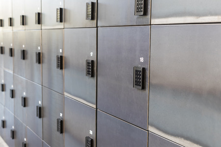 Background from the storage rooms with combination locks and numbersの写真素材