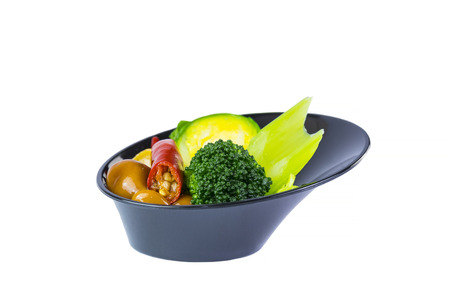 Mini appetizers from vegetable canap in plastic disposable dishes on white backgroundの写真素材
